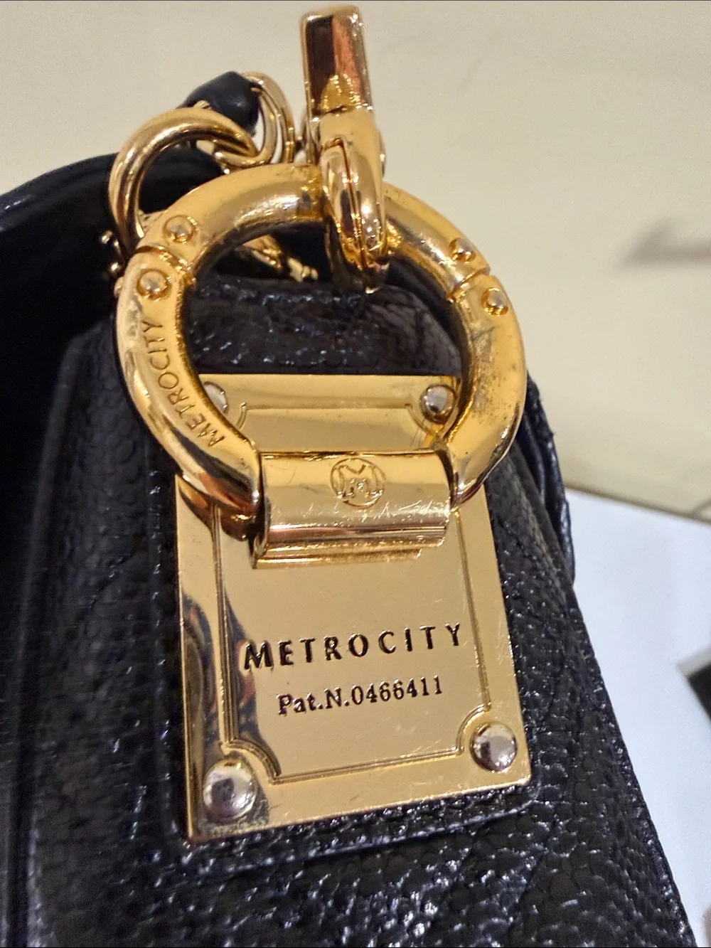 MetroCity Genuine CAVIAR Leather black quilted handbag - Tassel Accent